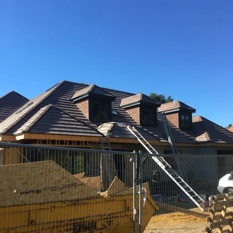 New build residential roof with plain tile covering and dormers — Never Felt Better Roofing, Surrey