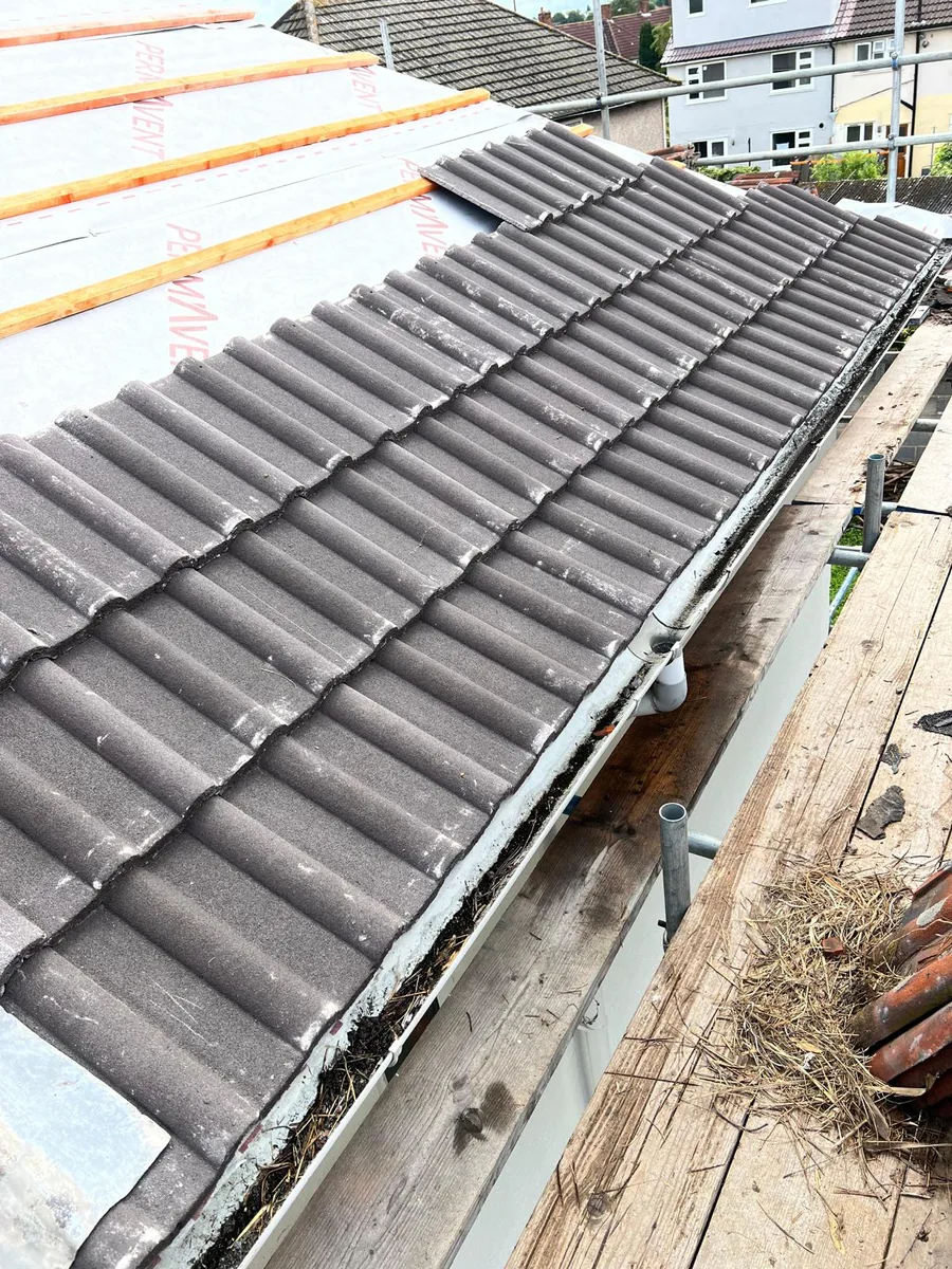 New concrete roof tile installation with breathable membrane — Never Felt Better Roofing, Surrey
